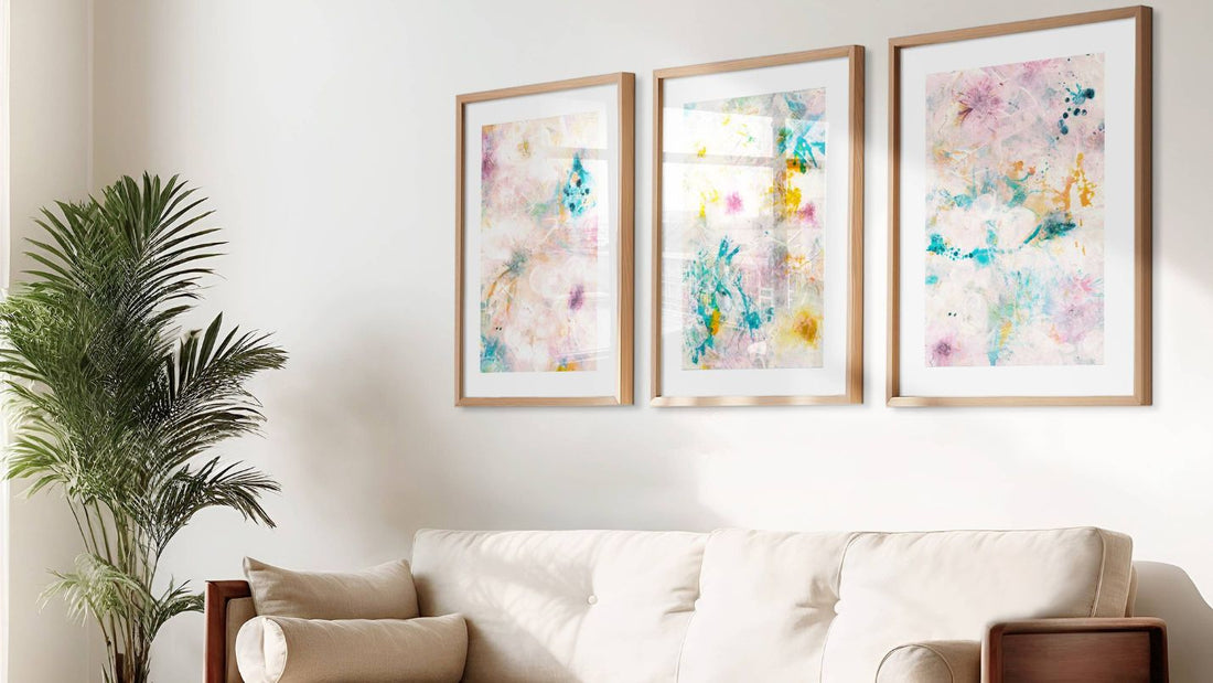 Turning your house into a home with abstract art - sofa with three abstract paintings above it